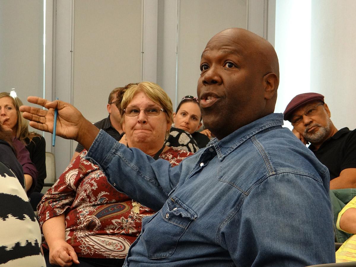 Music Department Chair Silvester Henderson argues a vital point during the meeting. Photo taken in 2013. 