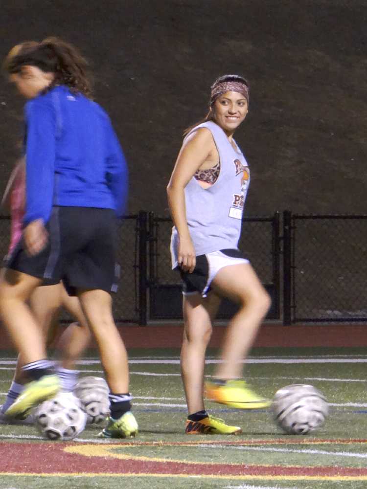 Forward Cely Paez smiles during Mondays practice after a stress relieving win last Friday in Yuba. 
