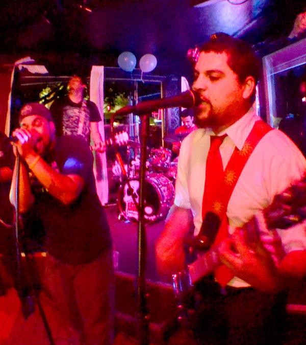 Terrance Williams and Christian Munoz rock out with their band, Day Labor, during their show on Oct. 18, 2013 at the Mutiny in Antioch.