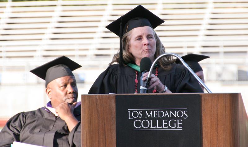 Classified Senate President Linda Kohler introduces students during the 40th Commencement ceremony.