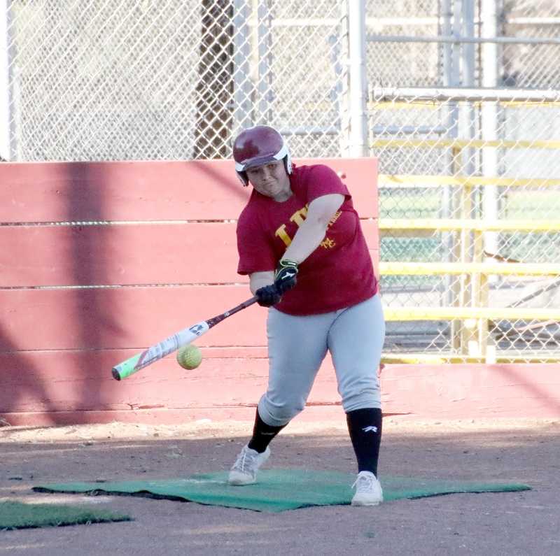 Mustangs+first+baseman+Quincy+Pierce+takes+some+hacks+during+practice.+