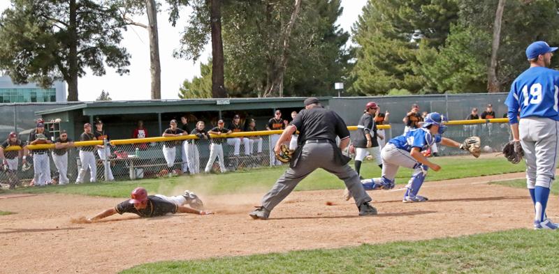 The Mustangs ended a three-game losing streak Saturday, March 21 with a 2-1 win over first place Solano College. Center fielder Jerome Hill slides into home safely for what would be the winning run on a single by catcher Ethan Utler.