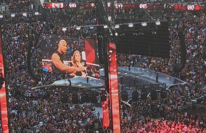 After a confrontation with the Authority, Triple H and Stephanie McMahon, Dwayne “The Rock” Johnson brought UFC star Ronda Rousey to the ring as back up.