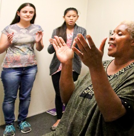 LMC Instructor and Kadesta Prothro-Harris claps to the beat with Melissa Hulsey and Bethany Gella. 