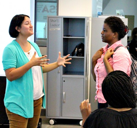 Flor Mounts, M.D. speaks with Azuka Atum at the MESA center.