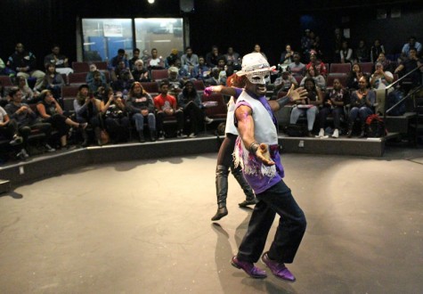 "Samba Funk" dance crew leader Aytchan "King Theo" Williams performs on stage with a fellow dancer inside the little theater on Wednesday Nov.11 as part of an event focusing on the African Diaspora
