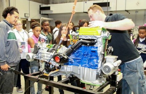 Seventh and Eighth Graders getting information on the Automotive Dept at LMC. Pittsburg, Ca., October 27, 2015. Jason Dearman Professional Mechanic Instructor is giving the kids a talk about what goes on when rebuilding a car engine. 