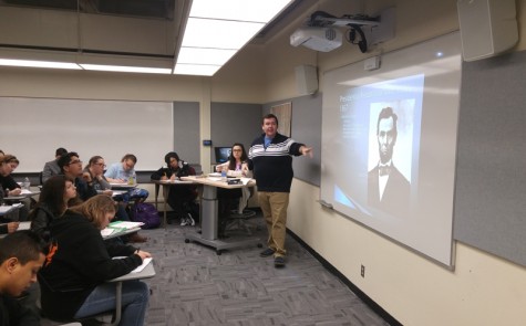 Joshua Bearden leads a class lecture on the post-Civil War Reconstruction era.