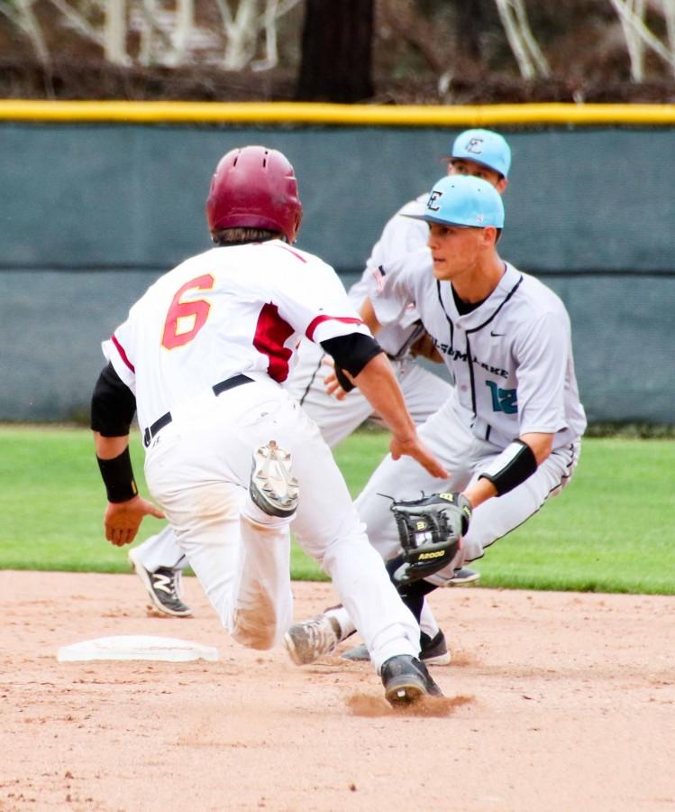 LMC's third baseman Tony Self is caught stealing by Folsom College's shortstop Troy Zeier.