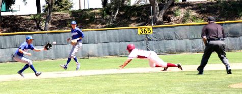 Mens Baseball, LMC vs Solano Community College, LMC player #8 Jason Kreske is diving in to second base as the third baseman is catching the ball.LMC, Pittsburg, Calif. Cathie Lawrence/Experience.