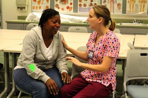 Andrea Thors Counsols Karima Dunlap as she simulates a traumitized victum