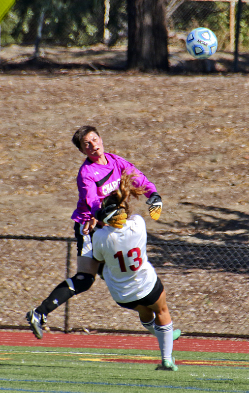 LMC Autumn Kish, forward, is taken down to the ground by the Chabot College goalkeeper.