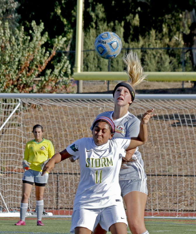 Los Medanos Colleges  Emma Spears takes a knock to her head to stop the ball in the 2-0 win over Napa.