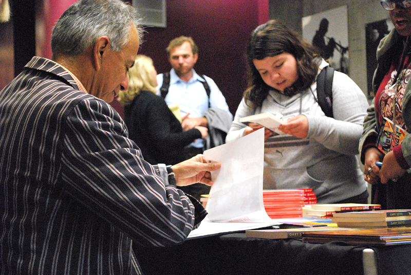 Gary Soto during the book signing following his presentation Tuesday, Nov. 7.