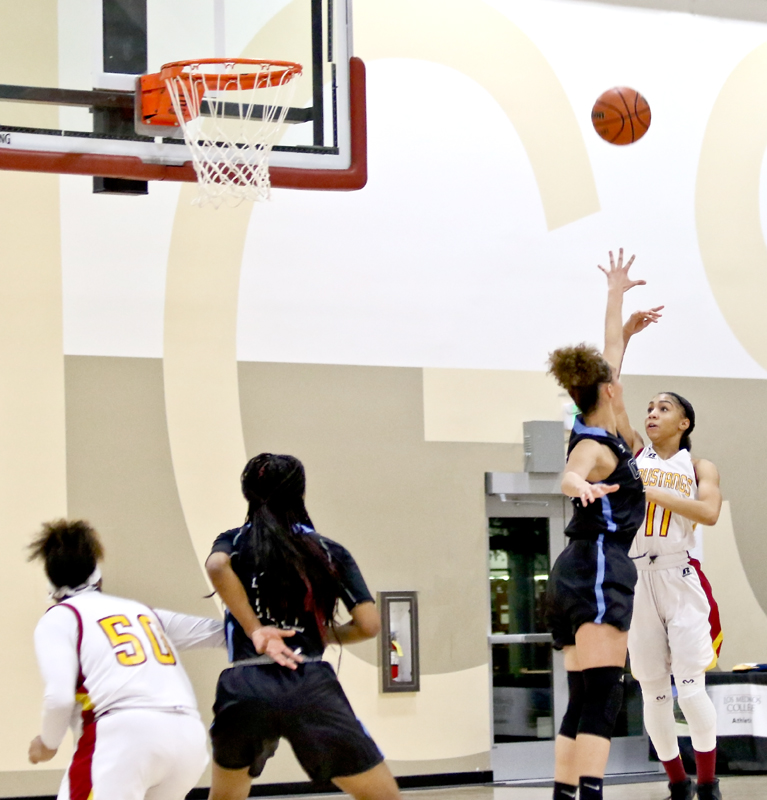 LMCs Adorah Buggs makes an attempted shot during their win over Contra Costa College.