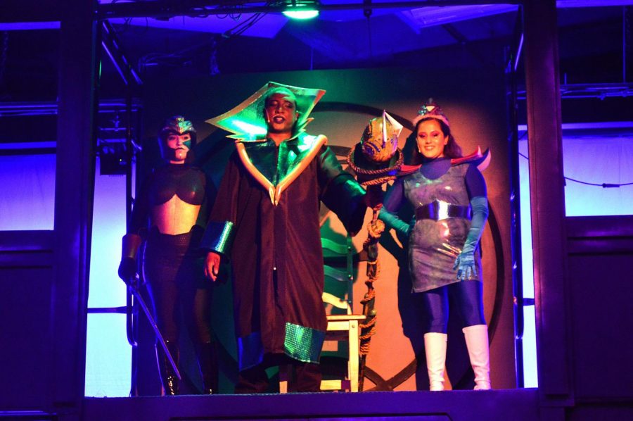Left: Caeli Durling alongside Brandon Diaz, as King Talon, and Kayla Martinez, as Princess Soltra at dress rehearsal. 