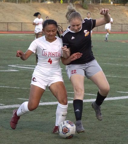 Jocelyn Guitierrez, No. 22, battles Alexis Xaysana, No. 4, for the ball during a soccer game on Sept. 11, 2019 at Los Medanos College in Pittsburg, Calif. 