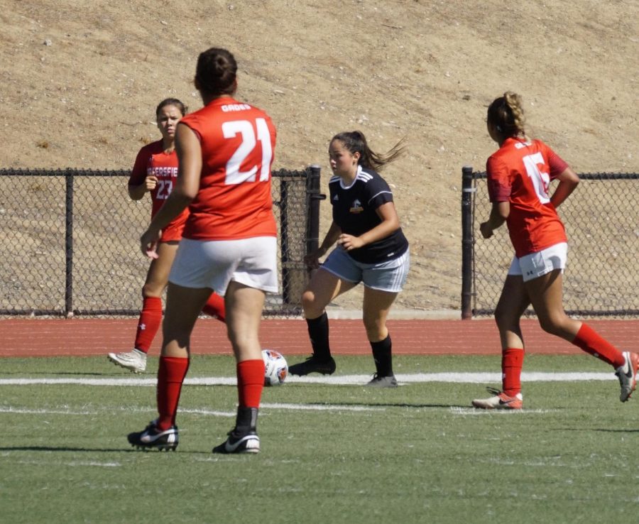 Jazmin Alanis, 2, takes on three Bakersfield College players during a soccer game on August 30, 2019 at Los Medanos College in Pittsburg, California.