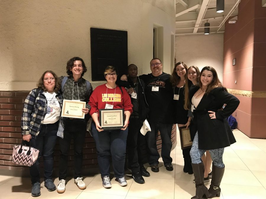 The Experience staff members showing off some of their 19 awards won at JACC Northern California. Photo taken Nov. 2019.