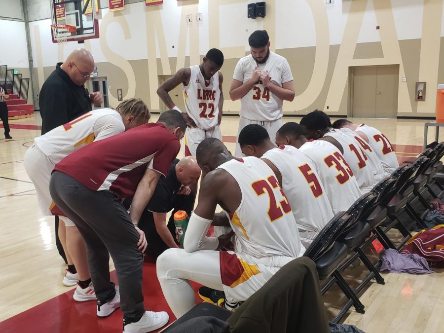 Head Coach Derek Domenichelli creates a play during a timeout during a basketball game against Solano College at Los Medanos College in Pittsburg, Calif on Friday, Jan. 31, 2020. 