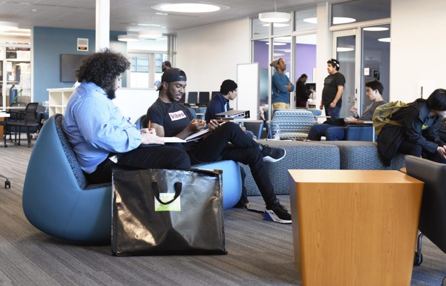 Students have a study session in the new Student Union building on the second floor.