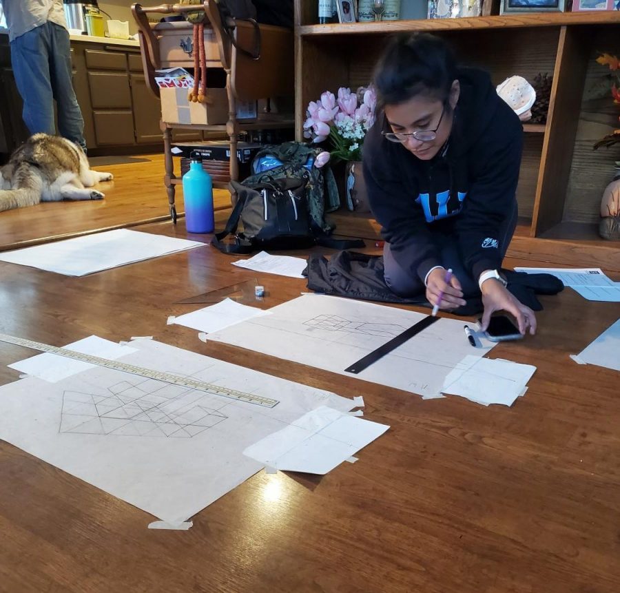 Kayla Quares works on a project for Ken Alexander’s design drawing class. Photo taken March 18. 
