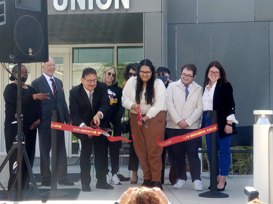 LMCAS+President+Luisa+Velazquez+and+District+Governing+Board+Vice+President+Fernando+Sandoval+cut+the+ribbon+in+front+of+the+Student+Union.