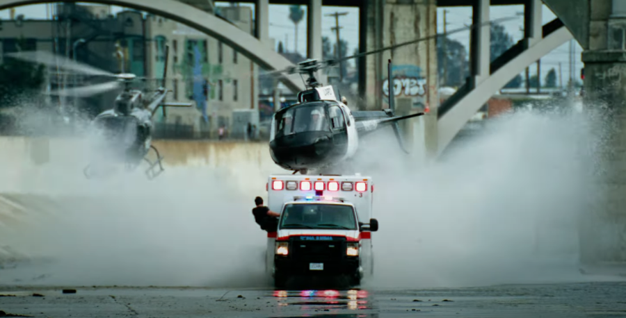 Jake Gyllenhaal and Yahya Abdul-Mateen II in a hijacked ambulance in Ambulance (2022).