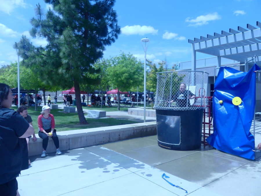 LMC Interim President Pamela Ralston getting dunked into the tank.