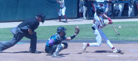 Los Medanos College Mustangs baseball player Colton Trudeau hits the ball into the outfield for a single.