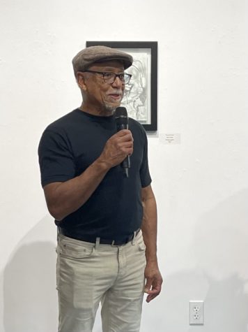 Local artist and juror of the student show, Foad Satterfield, begins the award reception with a quick introduction. 