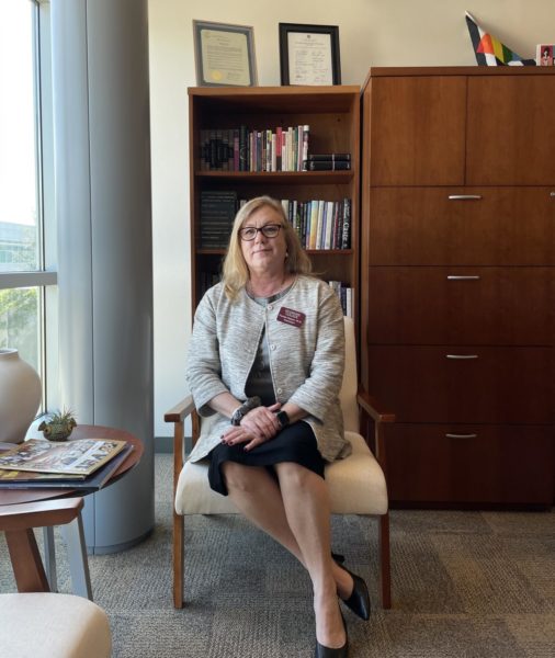 Dr. Pamela Ralston sits comfortably in the presidents office.