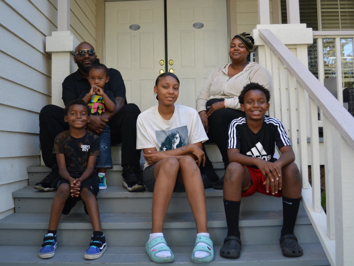 Smiles stretch across the steps of Clayton’s current home in Antioch with her daughter Gabrielle B, sons Ka’Fani, Ar’Mani, and SeKani and father Anthony Lewis.