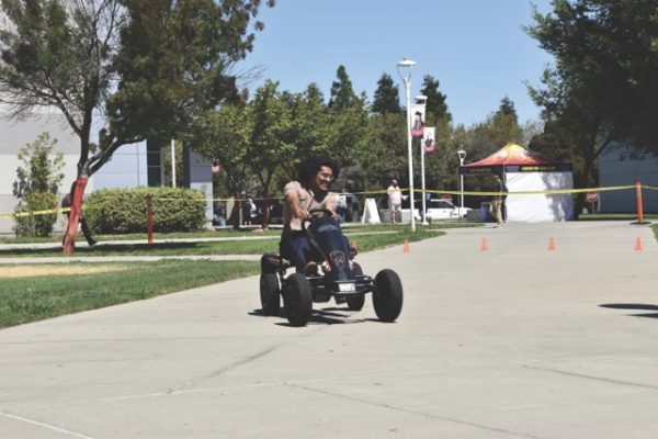 Student celebrates anniversary with Go-Kart races.