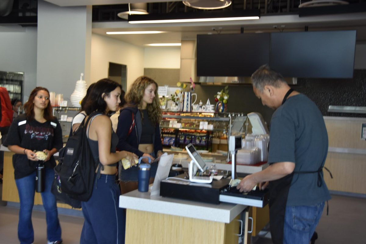 The cafeteria continues to serve food in the student union while the power is out. 