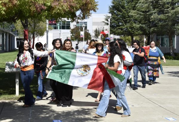 Students and faculty walking across campus to represent their flags, Sept. 17.