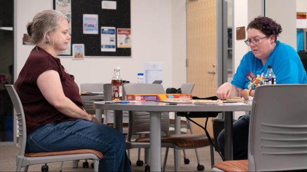 Librarian Roseann Erwin and Senior Library Technician Catt Wood play Scrabble, Oct. 3.