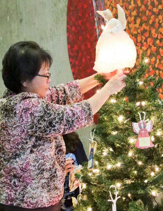 Eileen Valenzuela volunteering at LMC's Holiday Toy Drive on Nov. 30, 2015.