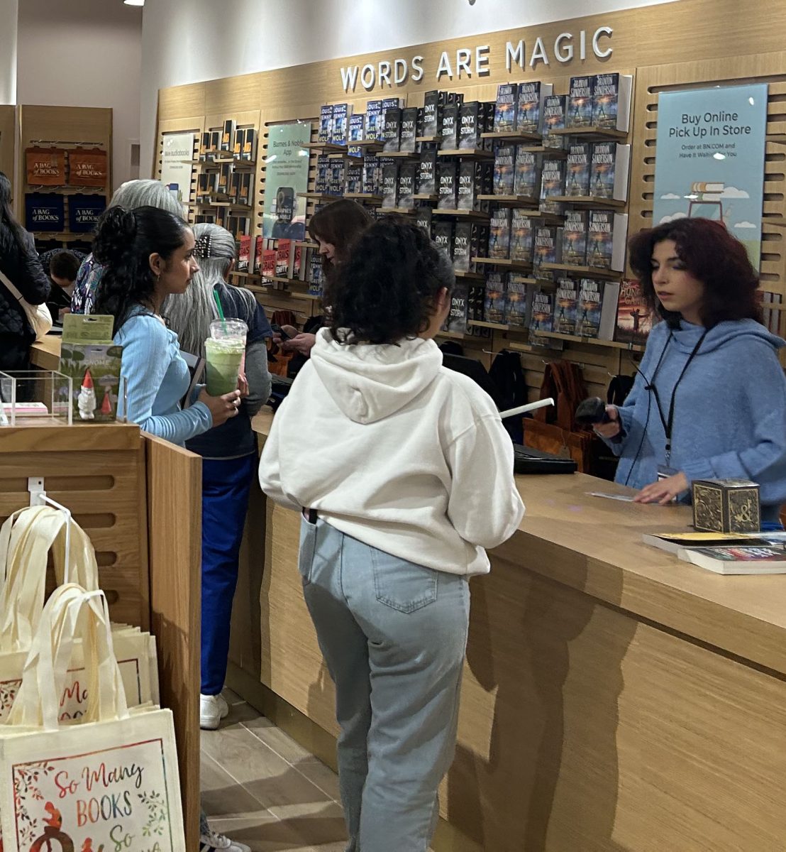 Customers check out on the opening day at the new Barnes & Noble in Brentwood.