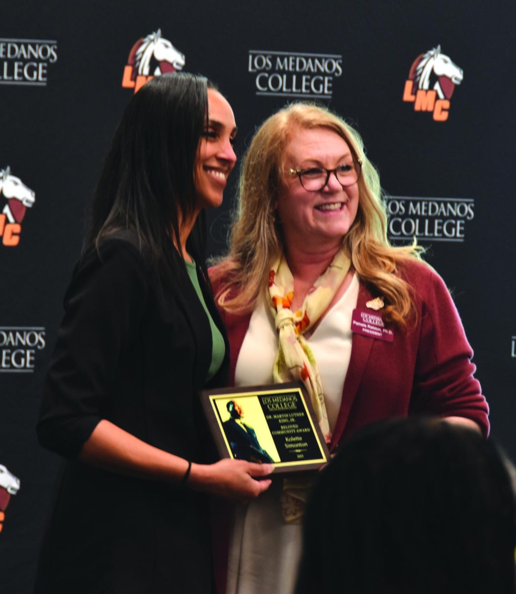 Director of Pittsburg Recreation Kolette Simonton poses with LMC President Ralston, on Pittsburg SU Conference Center, Feb. 26.