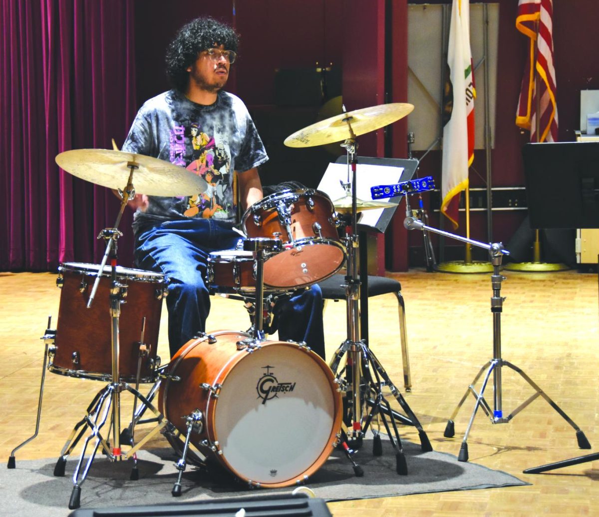 Former drummer Eduardo Rosales-Rodriguez rehearses with the jazz band.