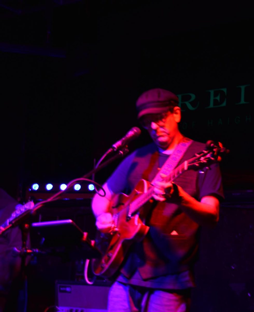 Professor Alex Sterling performs with his band Desto Reds at O'Reilly's Irish Pub in San Francisco.