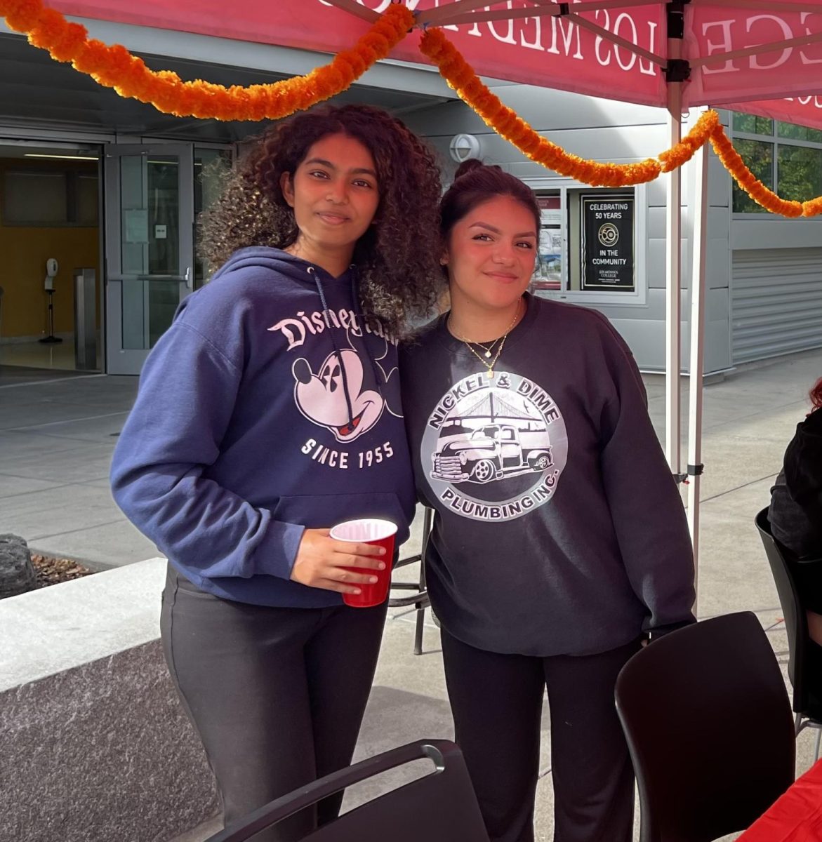 Tenisha Manoharan with student Mia Garcia, hosting last semester’s Diwali’s Festival of Lights event on Pittsburg Campus, Nov. 5.