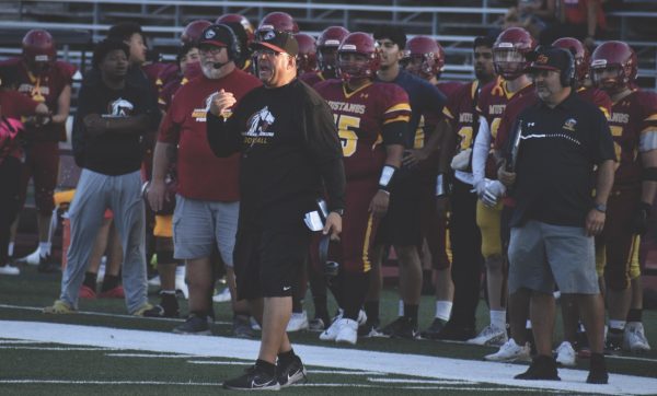 Archive photo: Head coach Chris Shipe yells for players to come to the sideline, on Los Meddanos football field, Fall 2024.