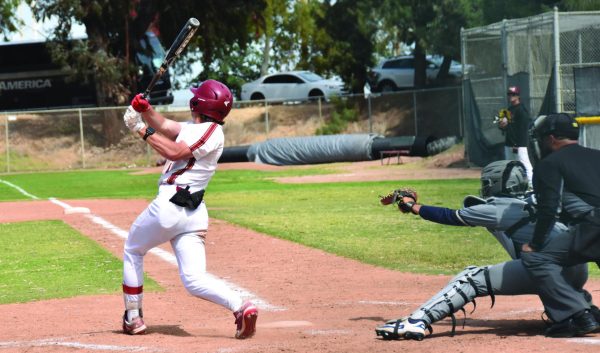 Mustangs infielder No. 4 Smith Chandler fouls off a pitch behind the backstop in a home game against Yuba at LMC in Pittburg, April 15.