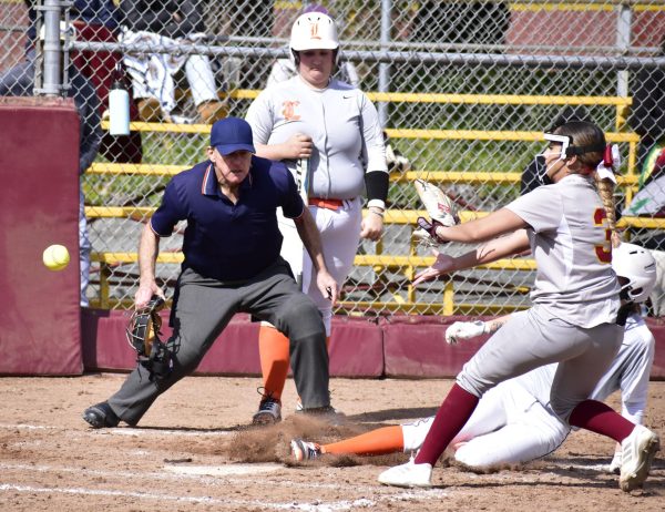 A play at the plate in a game on March 16, 2023 against Lassen. 