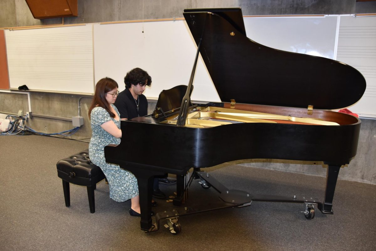 Serenitee Yap and Carlos Chamochos play a duet together. 