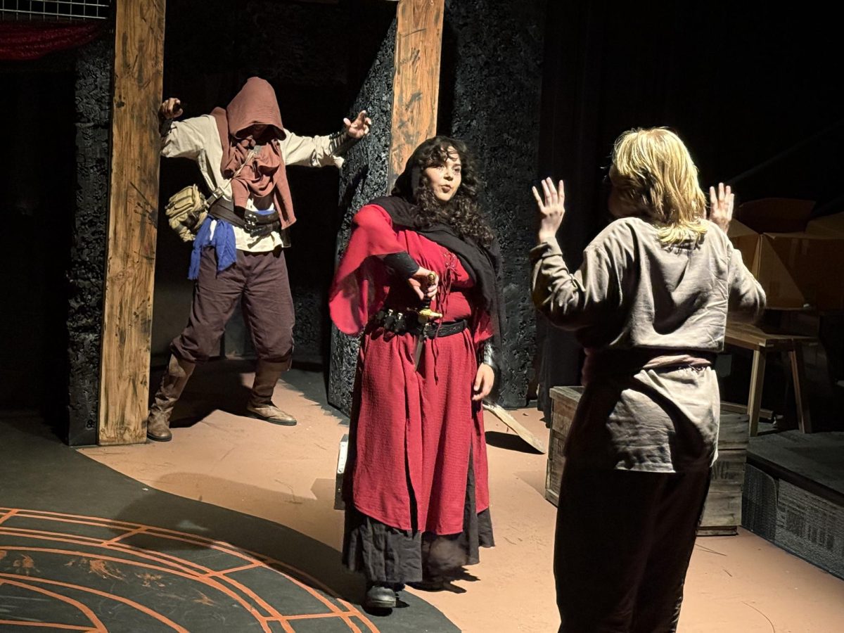 Citali Perez as the Keeper confronts Phoenix.