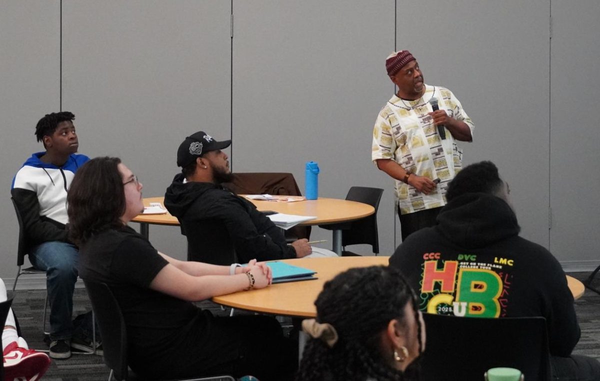 CCC Professor and Expert on Pre-Colonial Africa Manu Ampim delivers a presentation during the Umoja Scholar programs's event centered on Pre-Colonial Africa.