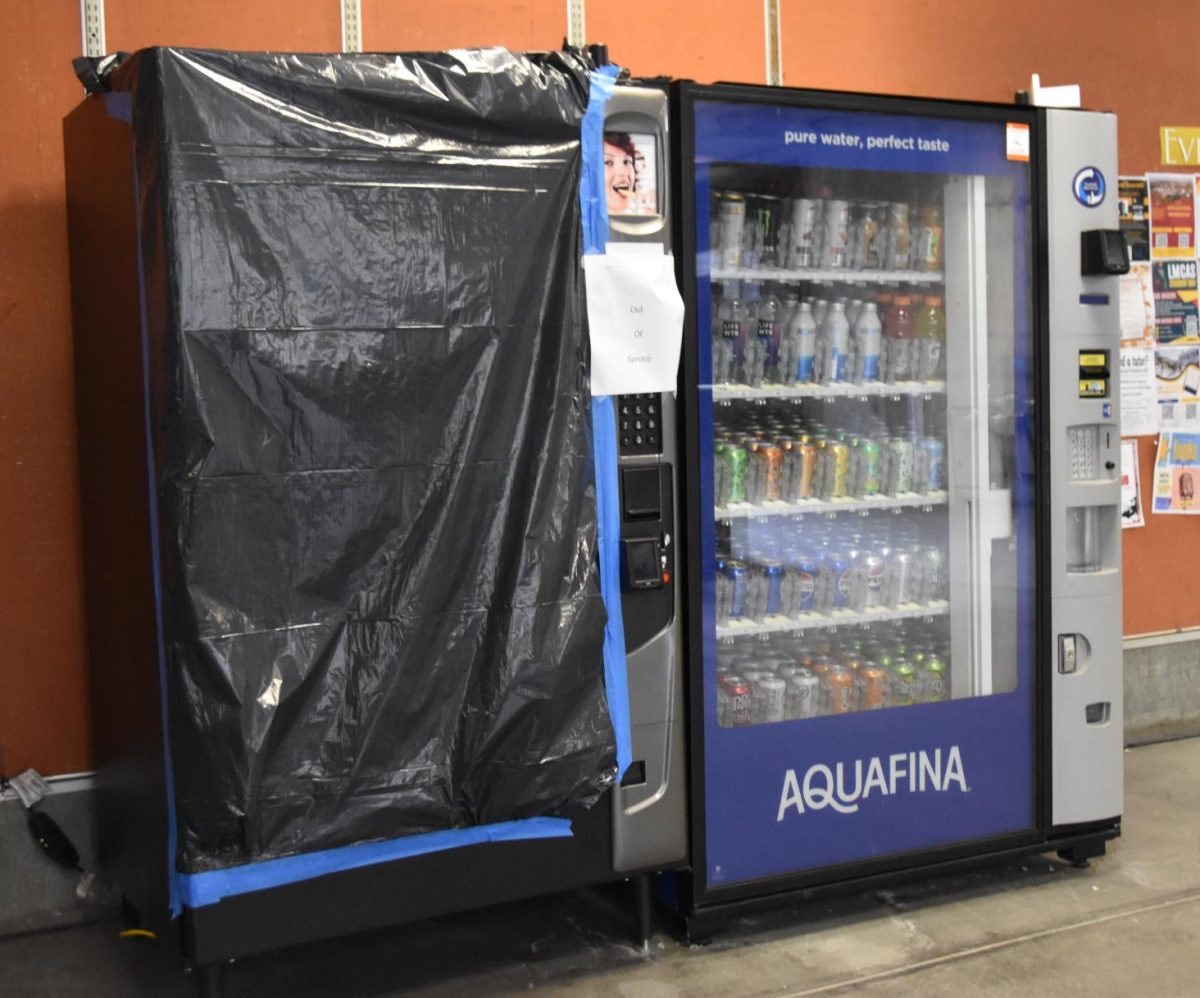 A vending machine that was broken by the suspect in the College Core Complex building.
